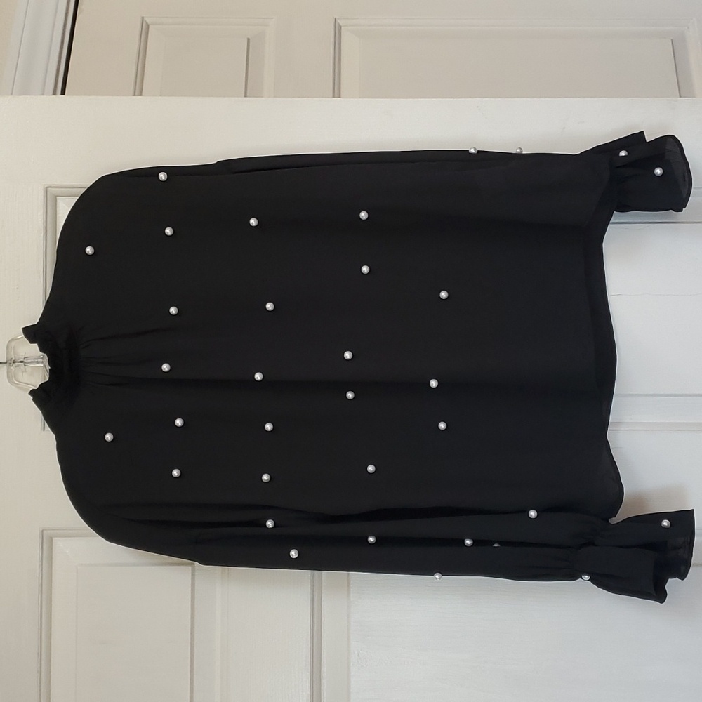Mock neck blouse.